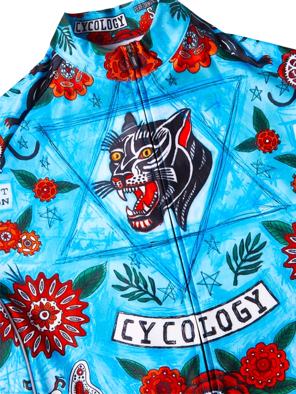 Colorful cycling jersey with a panther design and 'Cycology' branding on a blue background
