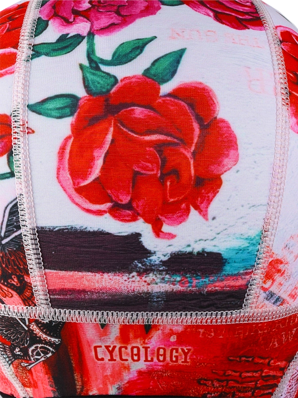 Colorful cycling beanie with red floral design and 'Ride' text on a white background