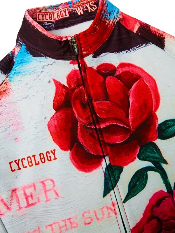 Cycling jersey with long sleeves and a red rose pattern and brand logo on a white background
