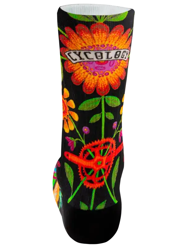 Cycling sock with vibrant floral and gear design, black background, bold colors for bike riders