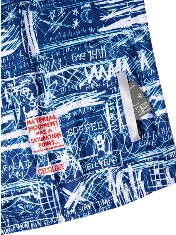 Blue cycling shorts with white graffiti-style print, featuring bold text and abstract designs for active wear.