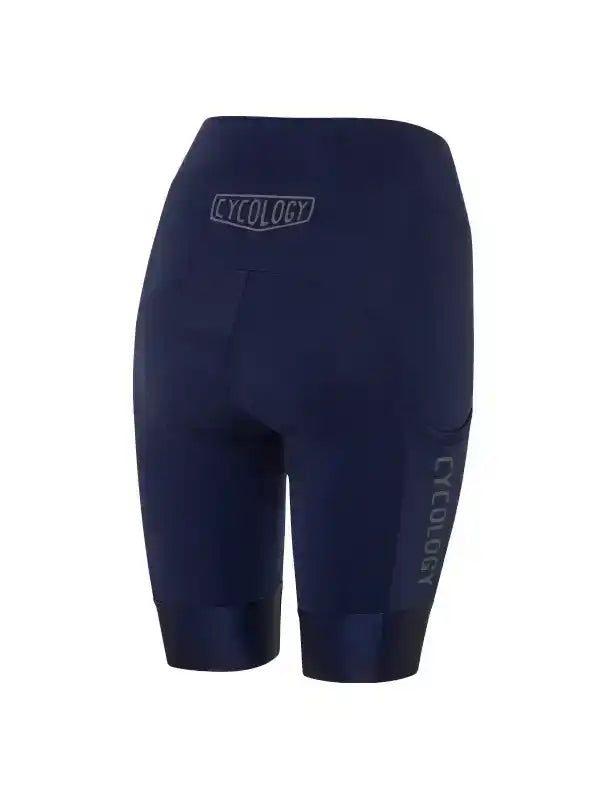 Navy blue women's cycling shorts with CYCOLOGY logo, designed for comfort and performance on rides.