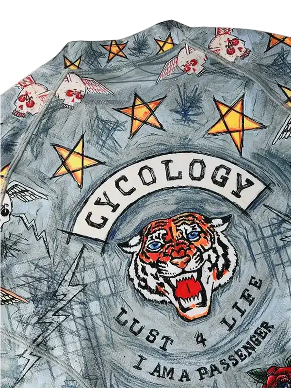 Cycling jersey with tiger, stars, and skulls design, bold 'Cycology' logo, 'Lust 4 Life' text