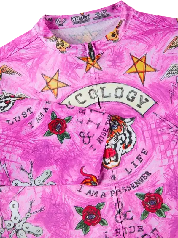 Pink cycling jersey with tiger, roses, stars, and bold text designs for men and women riders.