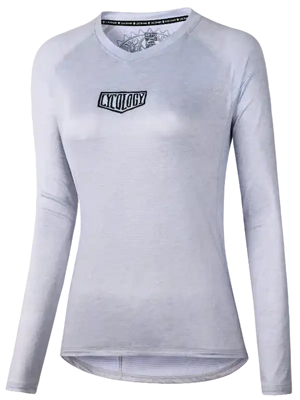 Light gray women's long-sleeve cycling jersey with 'Cycology' logo, ideal for active rides and comfort.