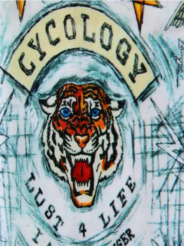 Tiger graphic design on cycling apparel with 'Cycology' and 'Lust 4 Life' text