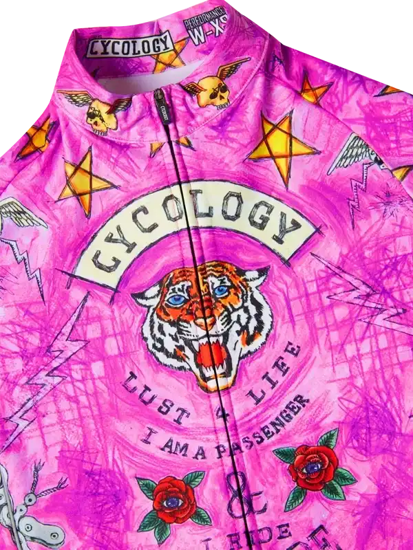 Vibrant pink cycling jersey with tiger, roses, stars, and 'Cycology' graphic design for men and women riders
