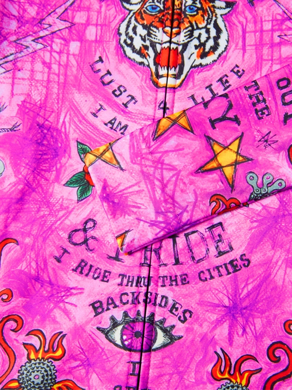 Pink fabric with tiger design and text