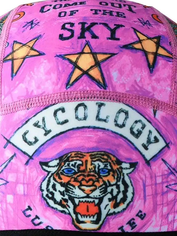 Pink cycling cap with tiger graphic, stars, and 'Cycology' text for women's bike wear