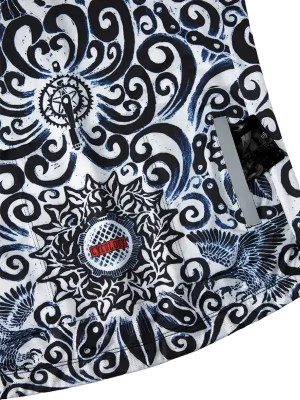 Men's cycling jersey with bold black and white swirl pattern, gear and bird motifs, reflective stripe