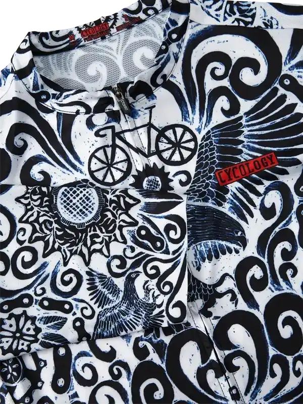 Men's cycling jersey with bold black and white bird, bike, and swirl pattern design