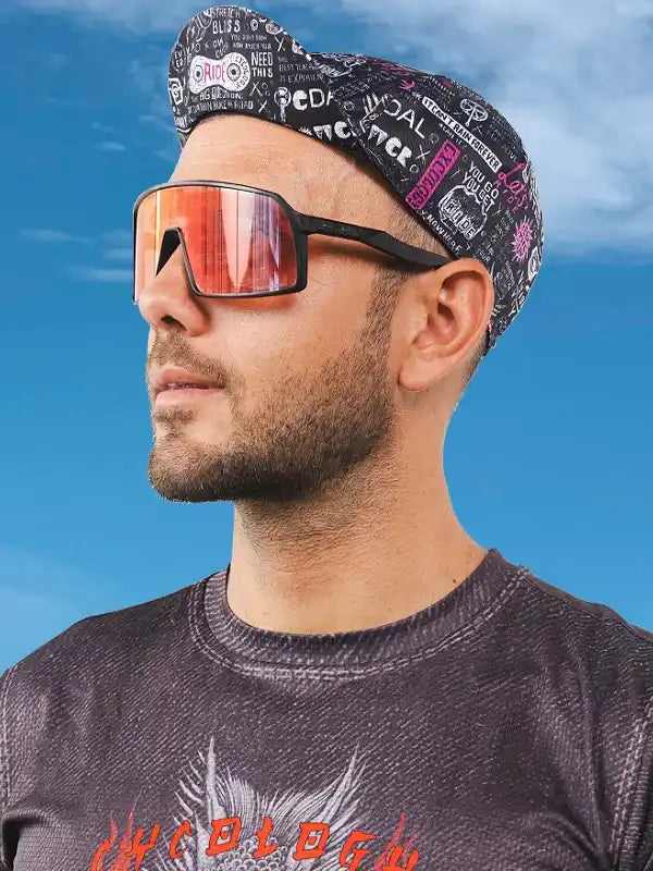 Man wearing cycling sunglasses and patterned headband, ideal for outdoor rides