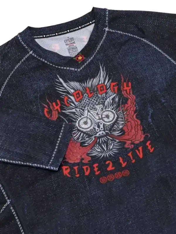 Dark denim cycling jersey with bold owl and bike graphic, 'RIDE 2 LIVE' text, red flame accents