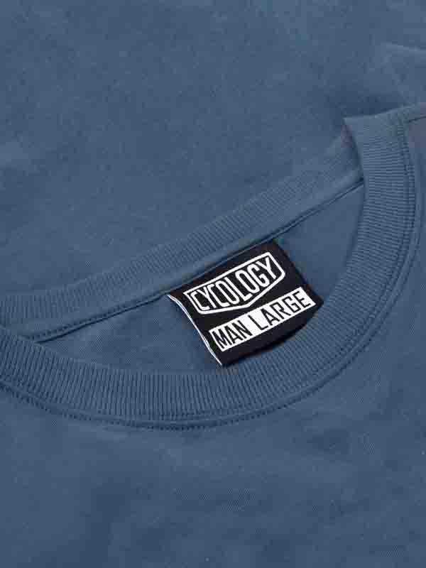 Blue cycling t-shirt with Cycology brand tag, men's large size, soft fabric detail