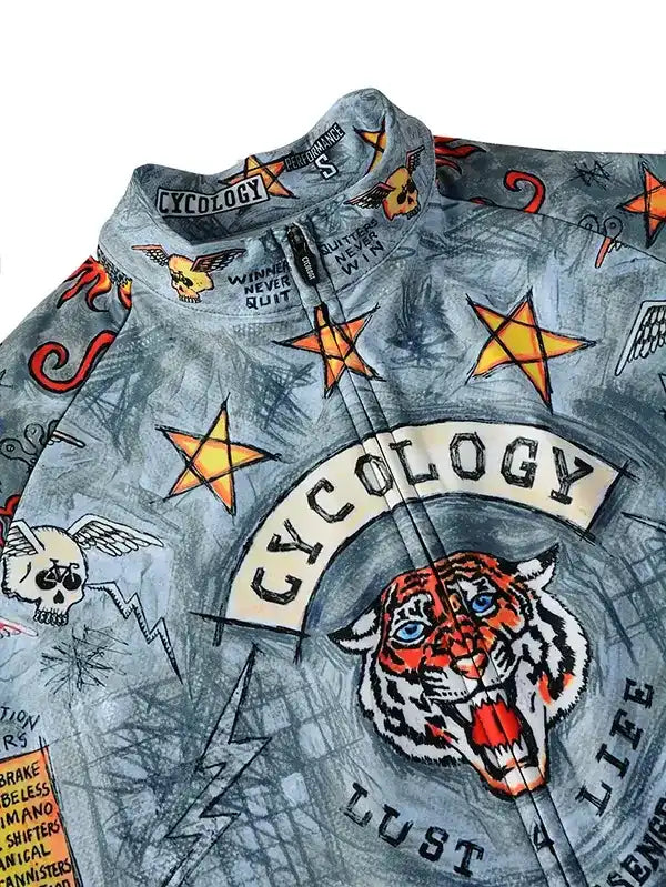 Men's cycling jersey with tiger, stars, and skull graphics, featuring 'Cycology' branding and performance design.