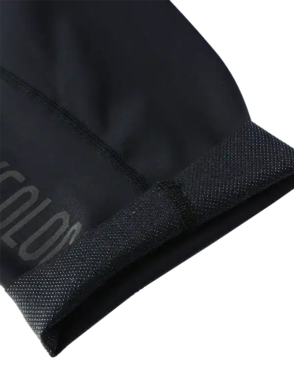 Black cycling jersey sleeve with mesh panel and subtle logo detail