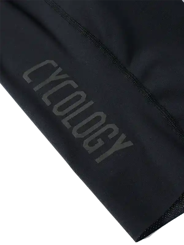 Black cycling shorts with 'CYCOLOGY' logo, high-quality fabric for men's and women's bike wear