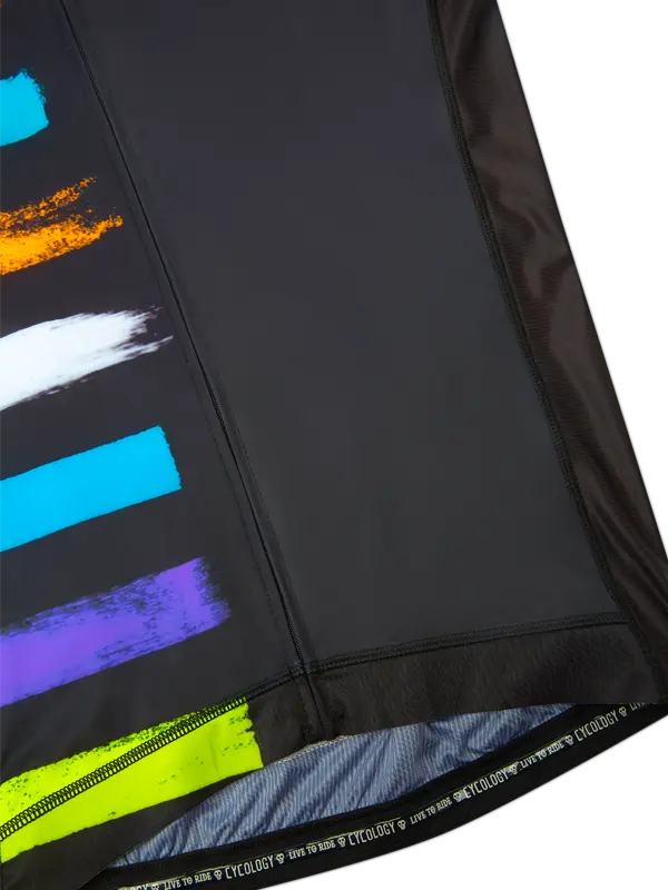 Black cycling jersey with colorful abstract patterns on a white 