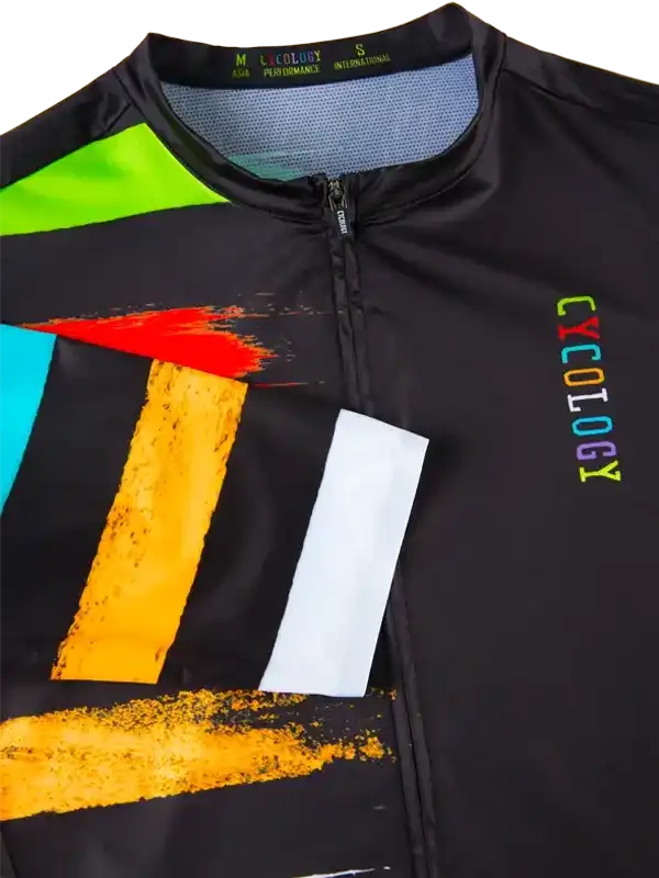 Black cycling jersey with bold colorful graphics and 'CYCOLOGY' logo, featuring zippered front and performance fabric.