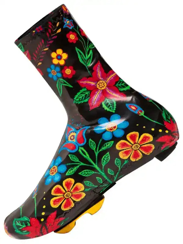 Black cycling shoe cover with vibrant floral print, waterproof design for road biking