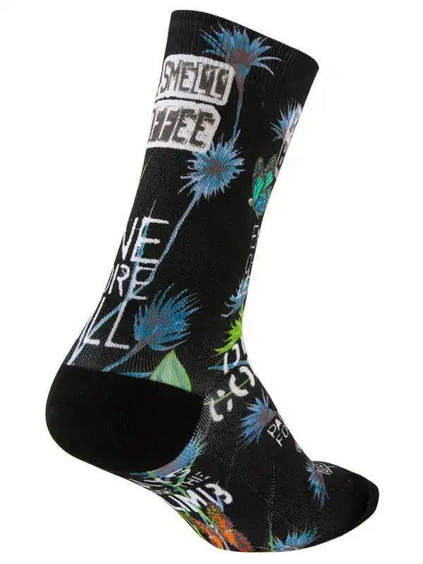 Black cycling sock with blue dandelion print and bold text, designed for men and women riders