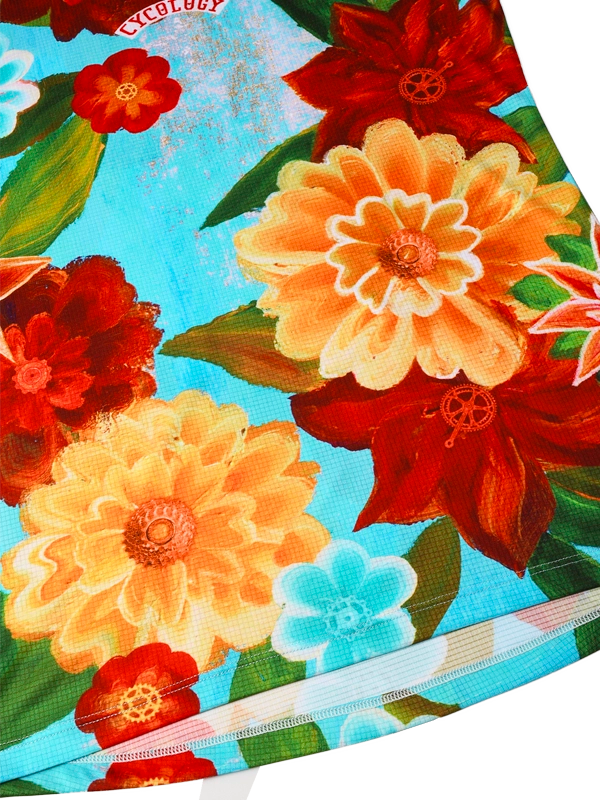 Close-up of colorful floral pattern with red, orange, and yellow flowers on a blue background.