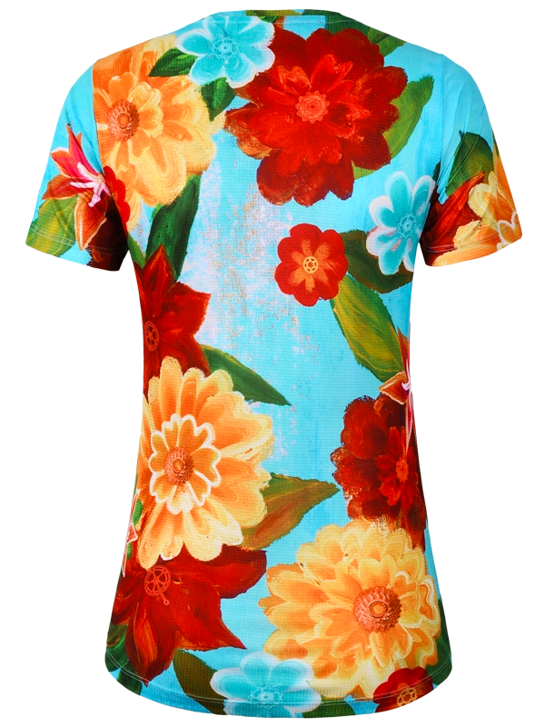 Women's colorful floral  technical t-shirt with red, yellow, and orange flowers on a aqua blue background