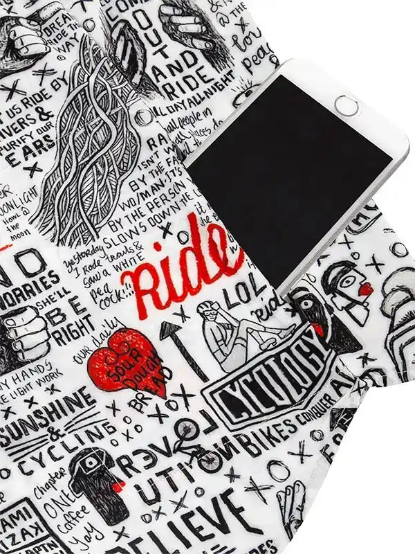 White cycling jersey with bold black doodles, red 'Ride' text, and phone pocket—perfect for bike rides.