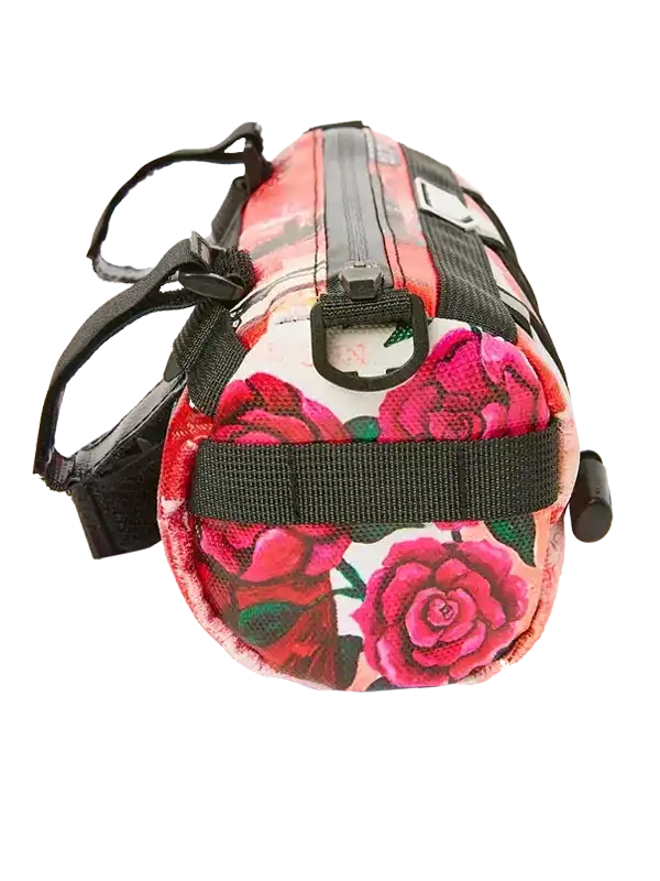 Floral rose print cycling frame bag with black straps and zipper, ideal for bike rides