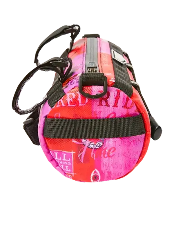 Pink and red patterned cycling frame bag with black straps and zipper, designed for bike storage