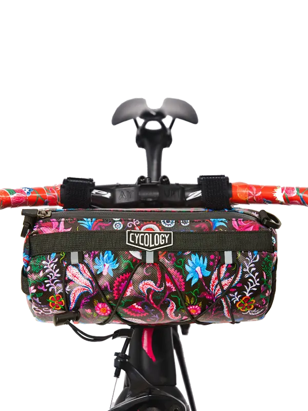 Floral-patterned bicycle handlebar bag with 'Cycology' branding 