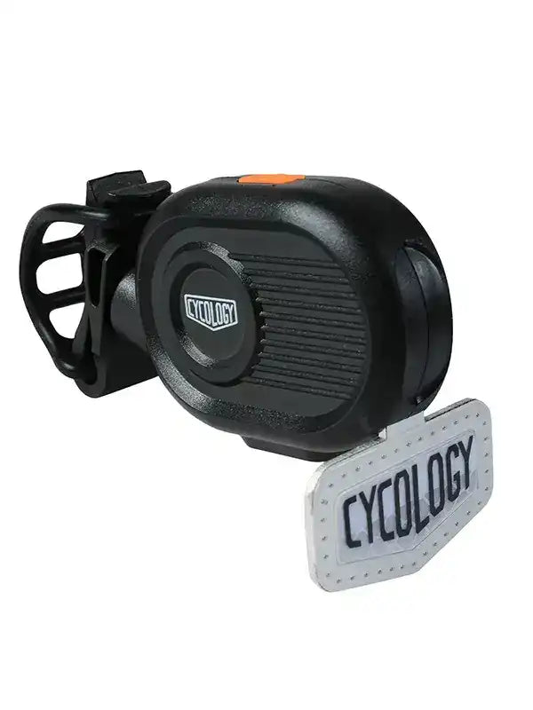 Cycology bike bell with black housing, orange button, and branded tag for cycling accessories
