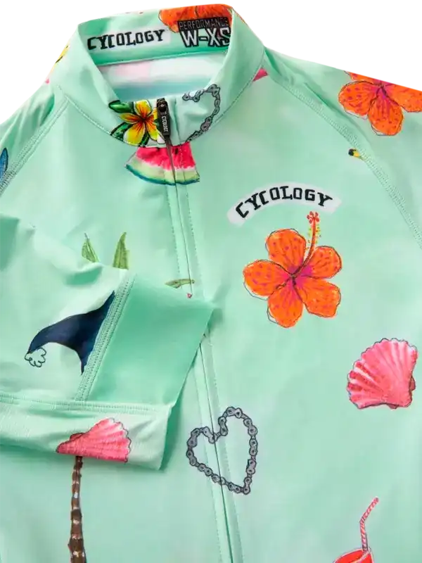 Mint green women's cycling jersey with tropical hibiscus, watermelon, and seashell print, featuring full zip and performance fabric.