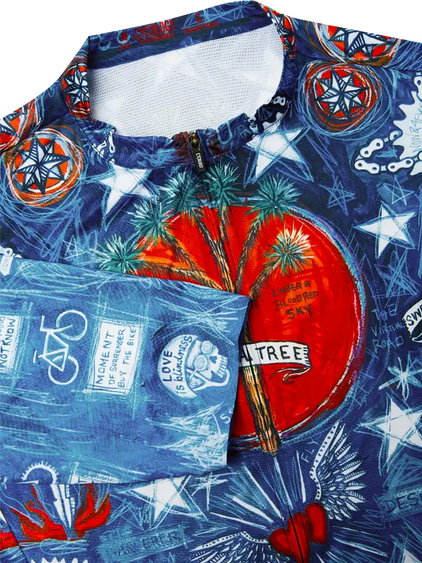 Colorful shirt with palm tree design and text on a blue background