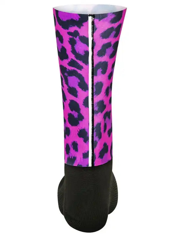 Pink and purple leopard print cycling leg warmer with black base and white zipper detail