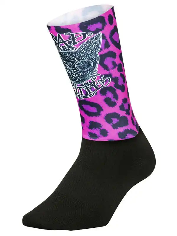 Pink leopard print cycling sock with skull and bike design, black foot, women's bike apparel