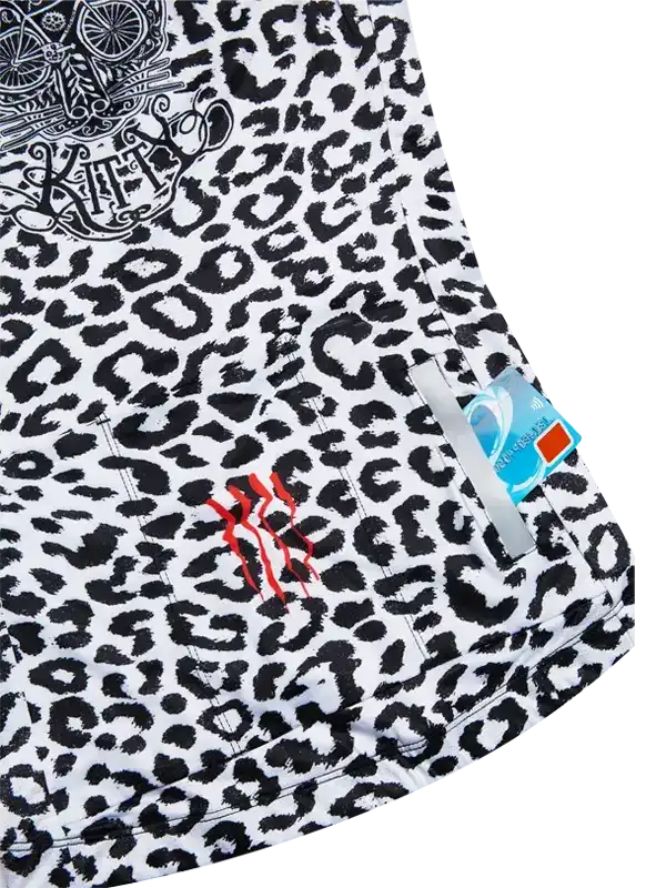 Women's cycling jersey with bold black and white leopard print, red graphic detail, and rear pocket