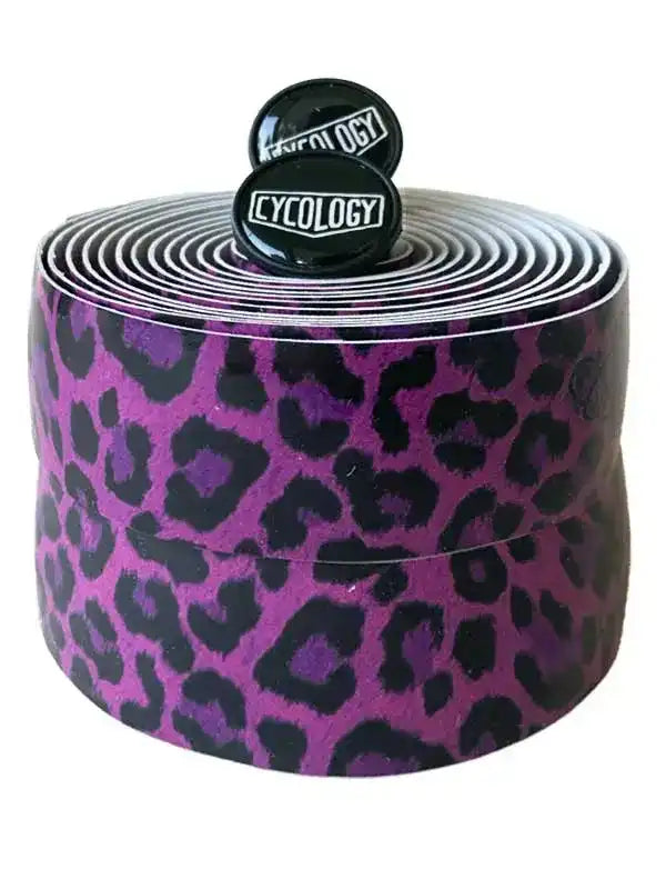Purple leopard print cycling handlebar tape with black Cycology end plugs