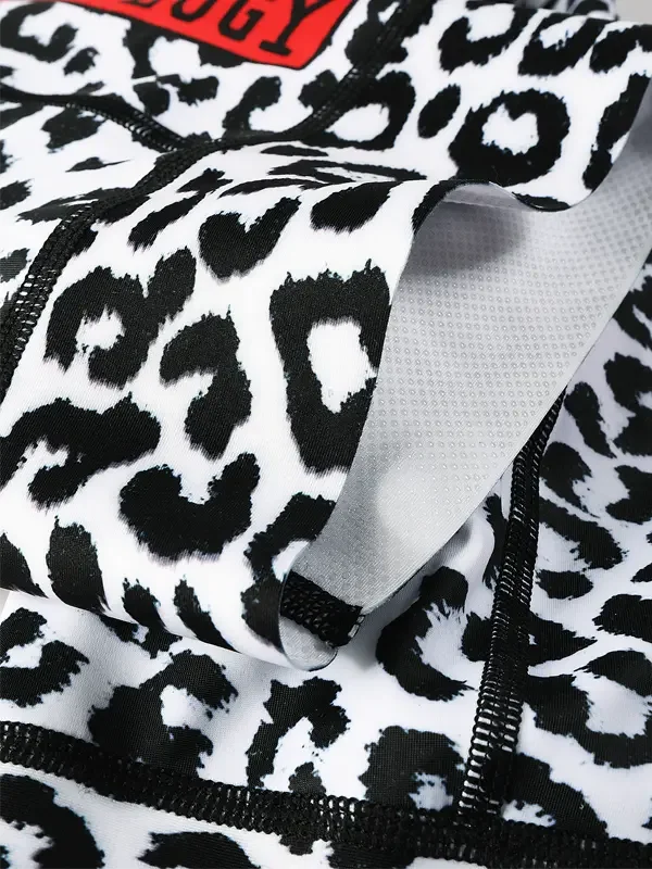 Black and white leopard print cycling jersey with mesh lining and zipper detail