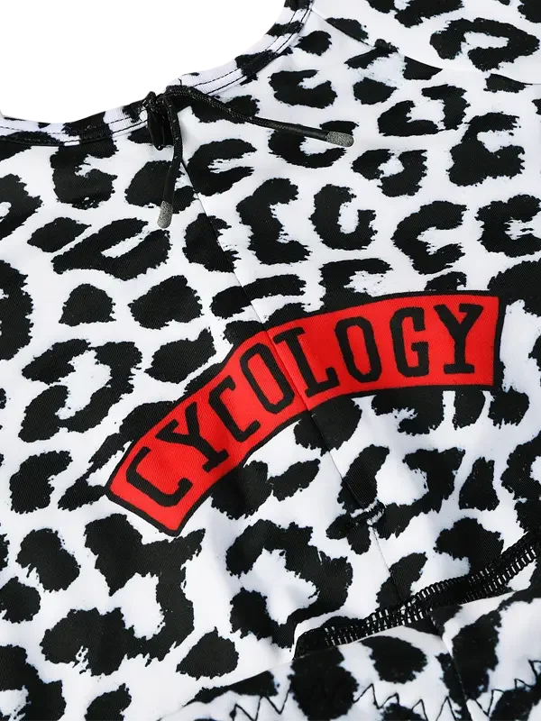 Black and white leopard print cycling jersey with red 'CYCOLOGY' logo patch