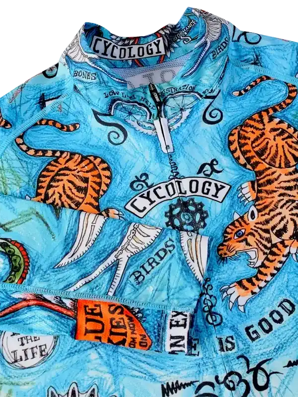 Blue cycling jersey with tiger print and bold graphics for men's and women's rides