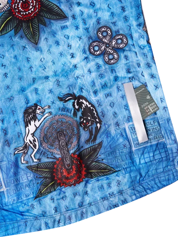 Blue cycling jersey with wolf, floral, and gear graphics; bold design for men's or women's rides