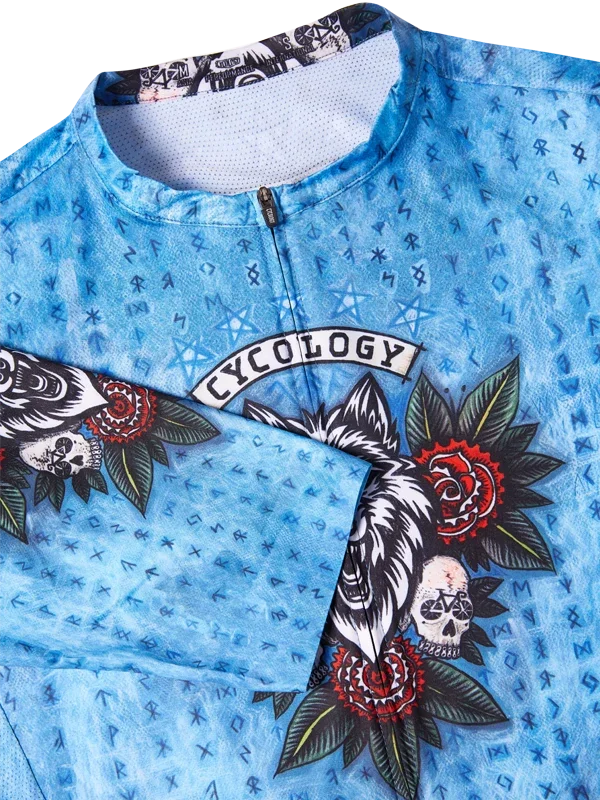 Blue cycling jersey with skull, rose, and 'Cycology' graphic design on front panel