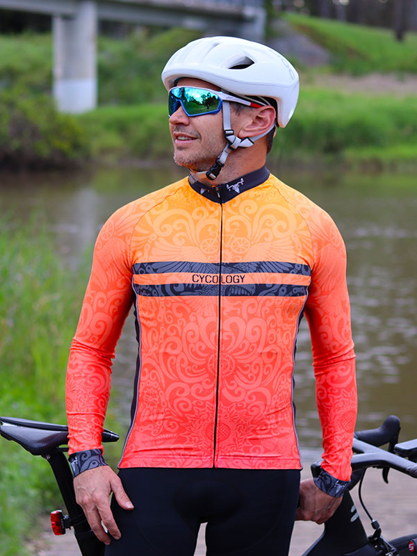 Life Behind Bars Men's Orange Long Sleeve Cycling Jersey on model | Cycology AU