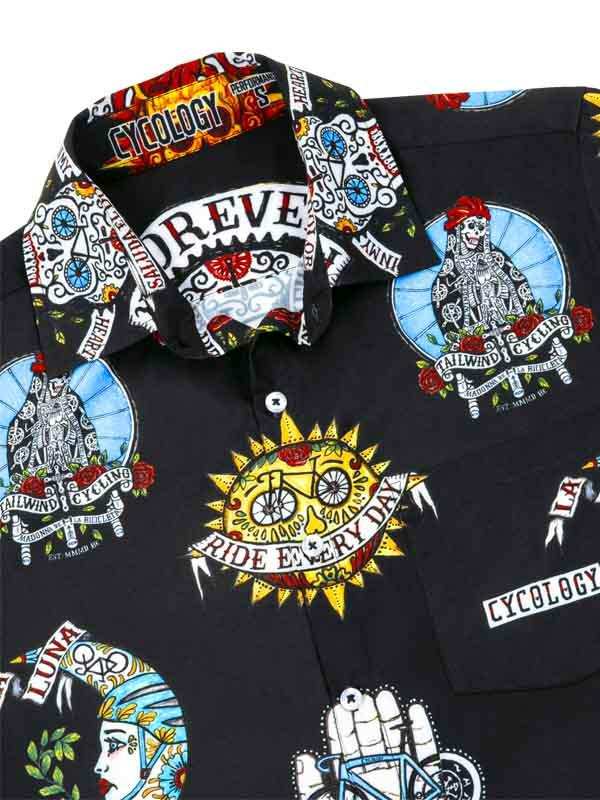 Men's cycling shirt with bold sugar skull and bike graphics, vibrant print on black fabric