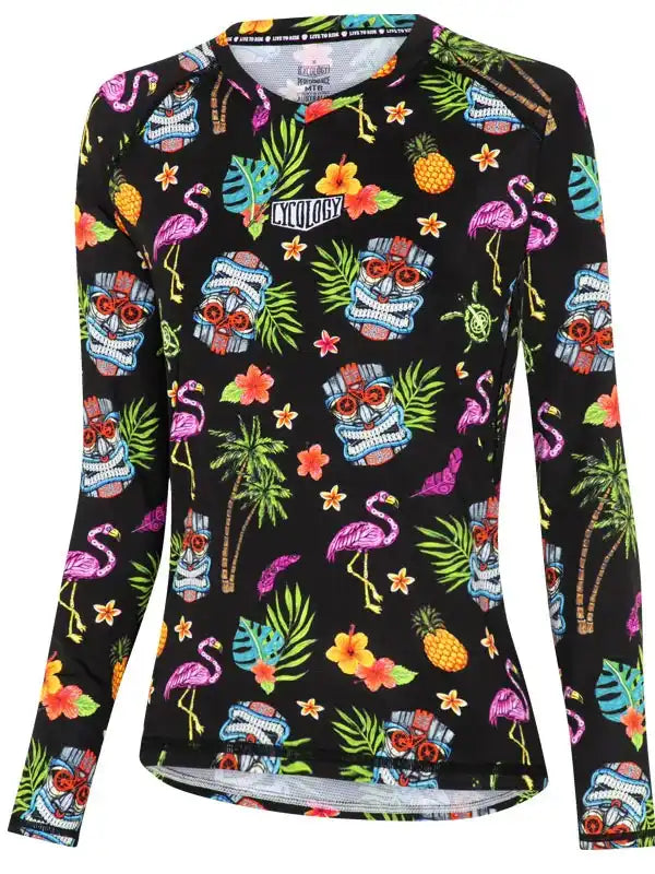 Women's tropical cycling jersey with flamingos, pineapples, and tiki masks on black background