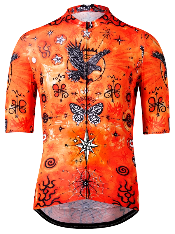 Orange cycling jersey with black and white designs 