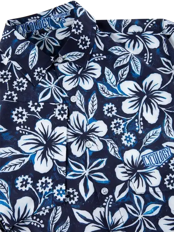 Men's navy floral cycling shirt with white hibiscus print and performance fabric details