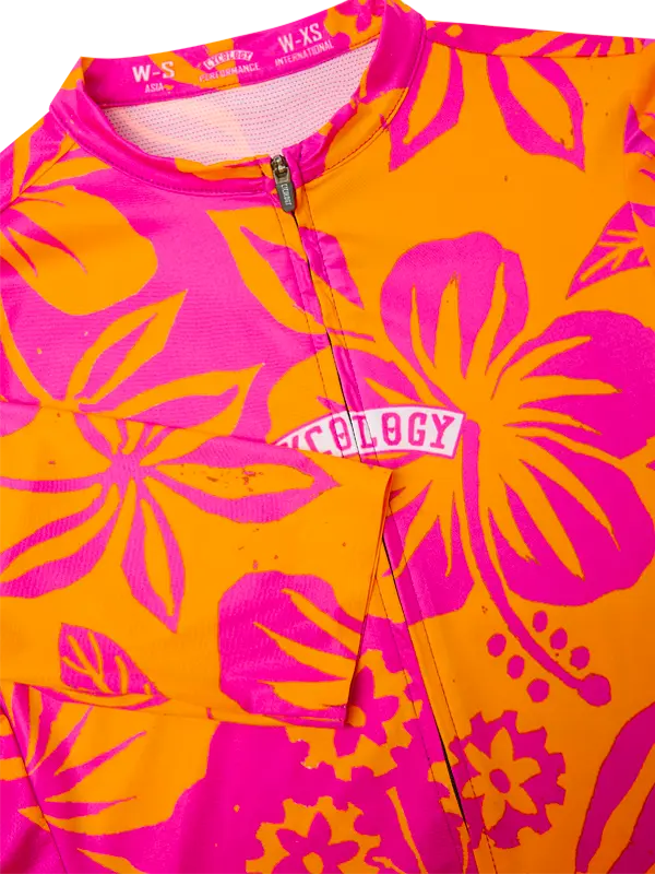Brightly colored jjersey with pink and orange floral patterns and 'Biology' branding.