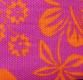 Close-up of purple fabric with a vibrant orange floral pattern.